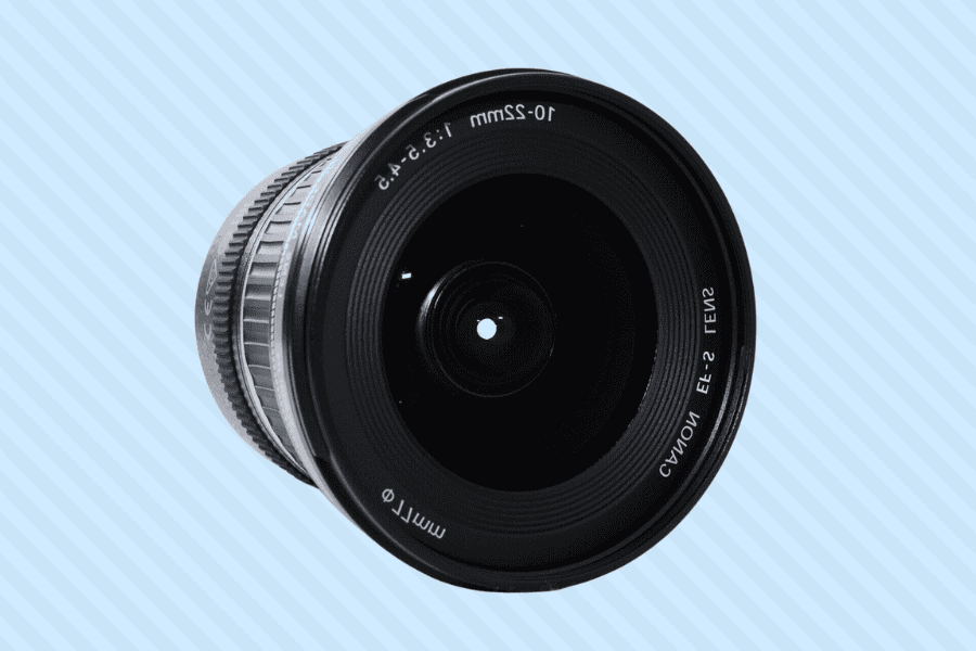 Graphic image of Canon 10-22mm camera lens with a diameter of 87mm