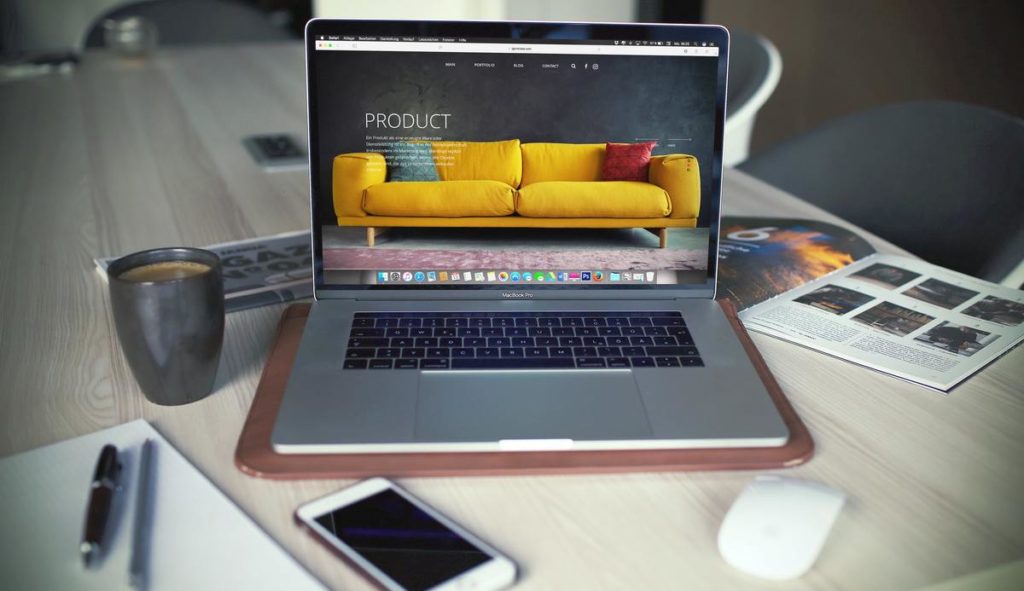 Laptop and phone on a desk