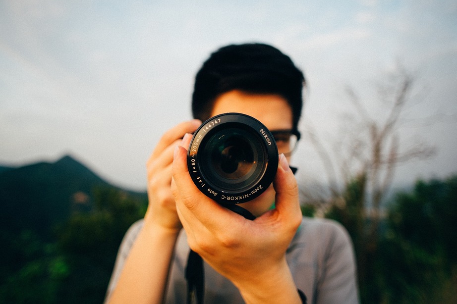 Focus shot of man using a camera