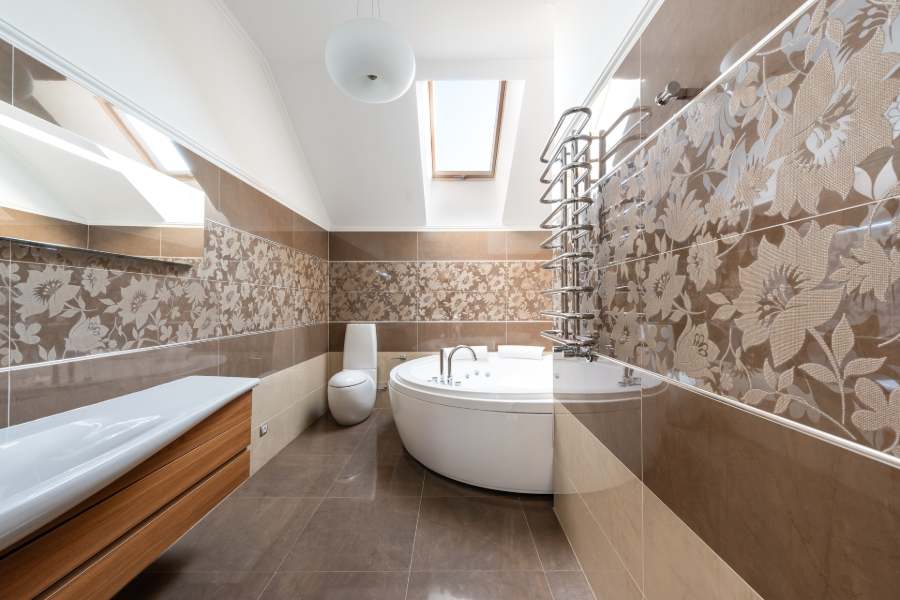 Bathroom with brown floral wall tiles